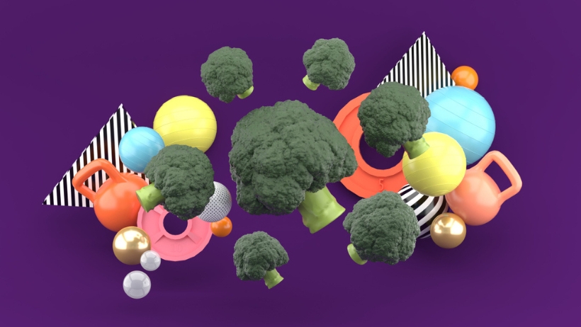 Eine Gruppe Gemüse auf violettem Hintergrund, perfekt für Veganer.